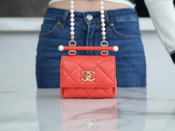 wsxc1742913583169_1 CHL 24ss Spring/Summer New Pearl Chain Mini Triangle Bag Orange 12cm