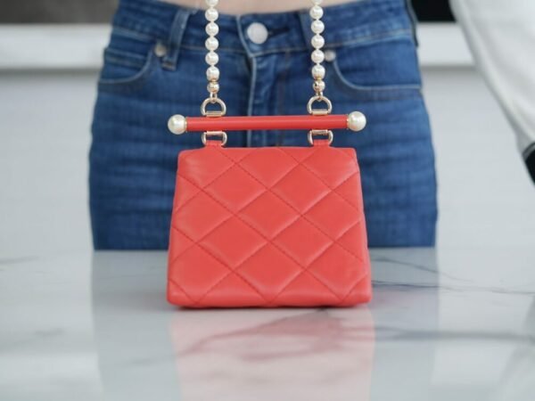 wsxc1742913583169_4 CHL 24ss Spring/Summer New Pearl Chain Mini Triangle Bag Orange 12cm