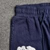DENIM TEARS COTTON WREATH SWEATPANTS NAVY