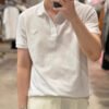11_0ef2feb0-b3df-4b4e-b95a-789c1619307b Prada Classic White Polo Shirt