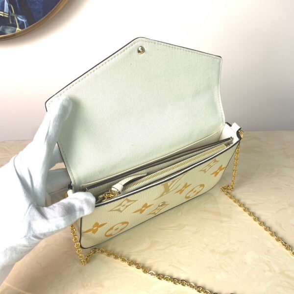 12b3b19f-1 LV Monogram Empreinte Pochette 21cm White