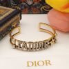 18K CD Tone Logo Star Bangle Bracelet