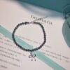18K T Bow Charm Bead Bracelet