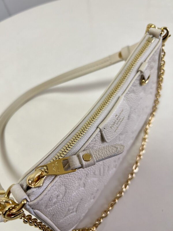 1f72b6ee LV Easy Pouch On Strap Monogram Empreinte Crème White For Spring, Women’s Handbags, Shoulder Bags 7.5in/19cm LV M81066