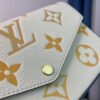 2be77c14-1 LV Monogram Empreinte Pochette 21cm White