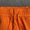 DENIM TEARS COTTON WREATH SWEATPANTS ORANGE
