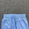 DENIM TEARS COTTON WREATH SWEATPANTS BABY BLUE