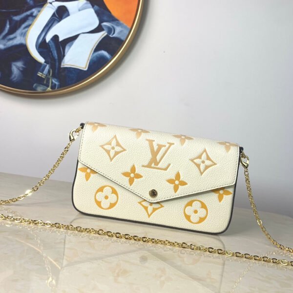 459218ea-1 LV Monogram Empreinte Pochette 21cm White