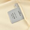 690aa6e5_4f64f1b1-821b-4b6e-946f-aaac95c39b45 Dior Cream T-Shirt with Black Trim