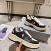 Golden Goose Cream and Black Star Sneakers