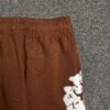 DENIM TEARS COTTON WREATH SWEATPANTS BROWN