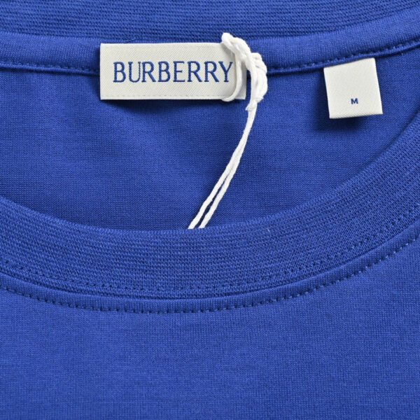 7_36fe686d-7d79-40e8-905e-aca4e2e681f9 Burberry Embroidered Patch T-Shirt (Blue)