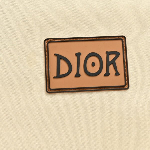 821d94cc_c6709b85-83de-40bc-94a8-dcb007b2c1ee Dior Cream T-Shirt with Black Trim