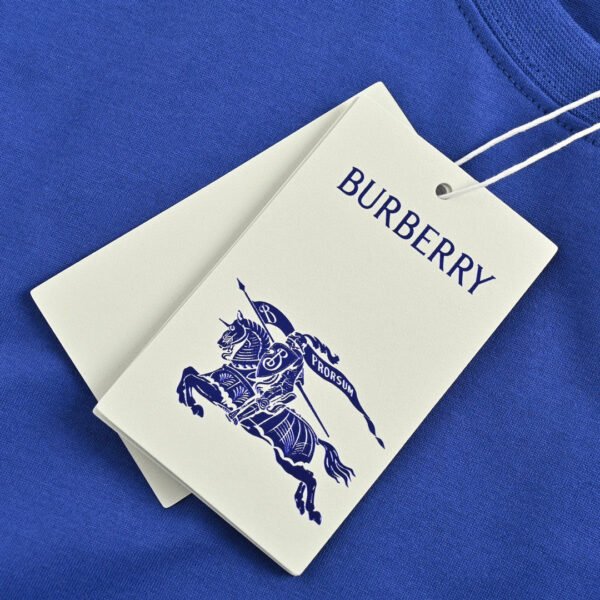 8_8d7c3176-3adc-4988-8f89-465f2f14f9fd Burberry Embroidered Patch T-Shirt (Blue)