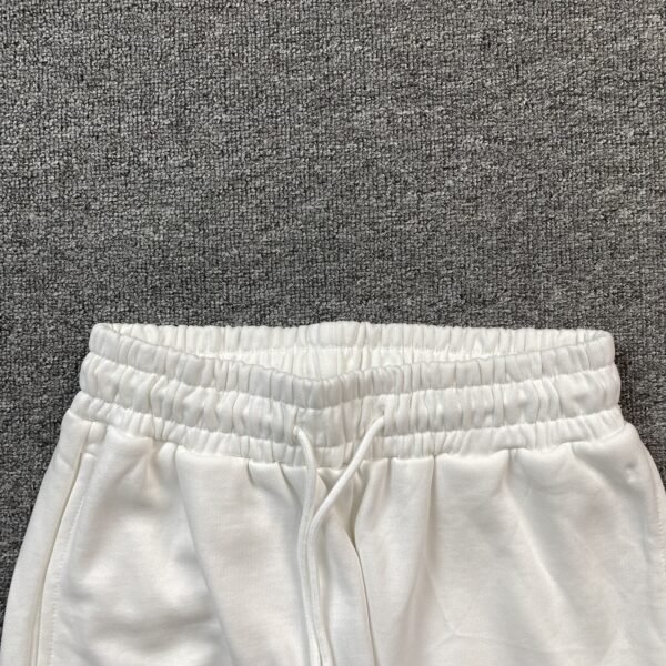 DENIM TEARS COTTON WREATH SWEATPANTS WHITE