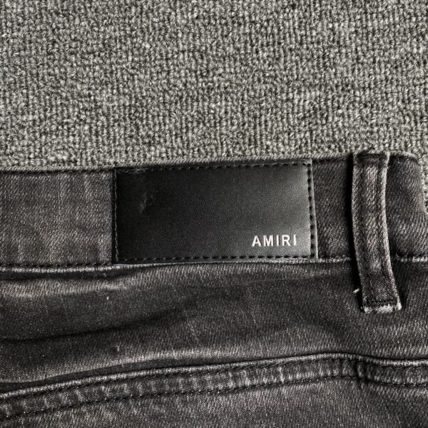 AMIRI SLASH SLIM JEANS