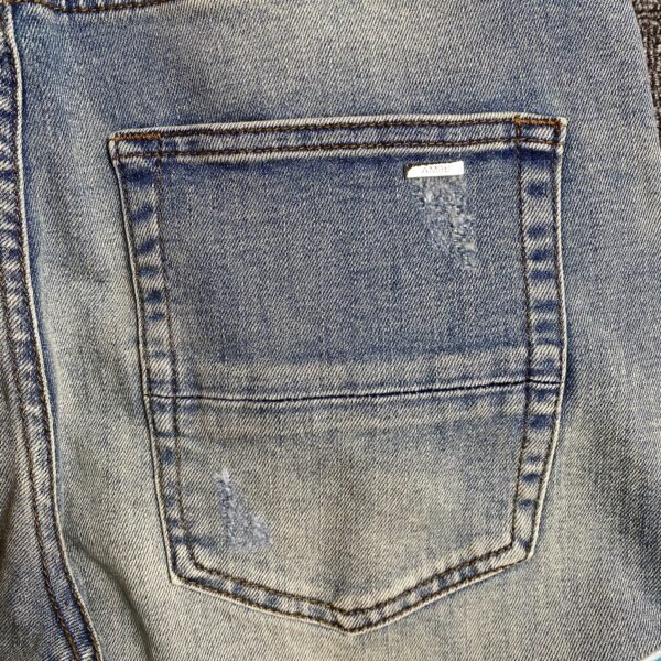 AMIRI VARSITY LOGO JEANS