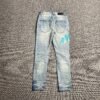 AMIRI VARSITY LOGO JEANS