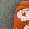DENIM TEARS COTTON WREATH SHORTS ORANGE