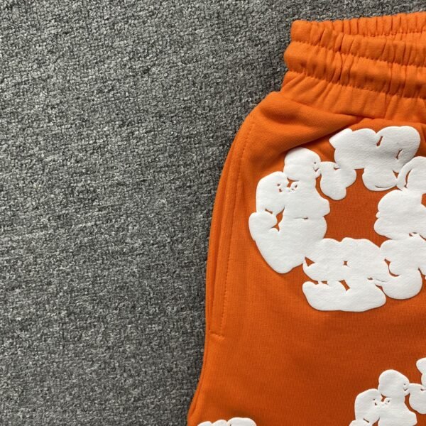 DENIM TEARS COTTON WREATH SHORTS ORANGE
