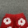 DENIM TEARS COTTON WREATH SHORTS RED