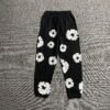 DENIM TEARS COTTON WREATH SWEATPANTS BLACK