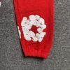 DENIM TEARS COTTON WREATH SWEATPANTS RED