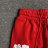 DENIM TEARS COTTON WREATH SWEATPANTS RED