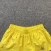 SP5DER DOUBLE LAYER SHORTS YELLOW