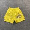 SP5DER DOUBLE LAYER SHORTS YELLOW