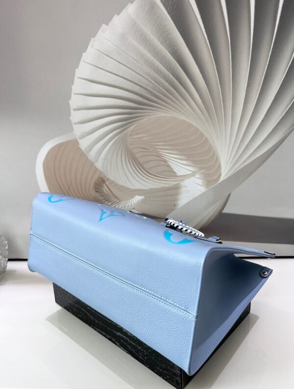 WhatsApp-Image-2022-04-20-at-4-42-42-PM LV OnTheGo MM Monogram Empreinte Summer Blue For By The Pool Collection, Women Handbags, Tote Bags 13.8in/35cm LV M45718