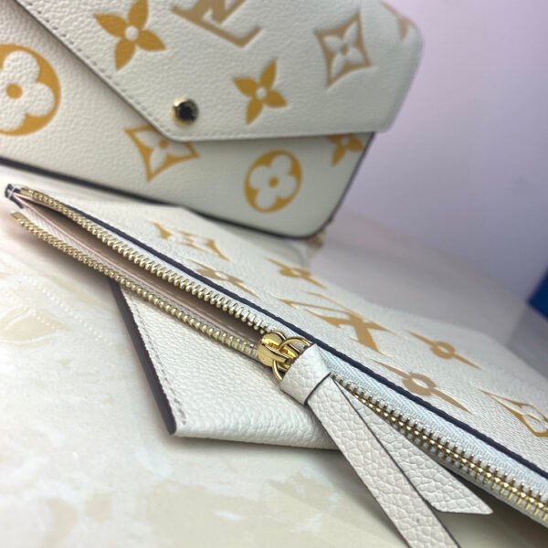 aa68172c-1 LV Monogram Empreinte Pochette 21cm White