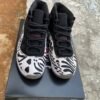 AIR JORDAN 11 "Animal Instinct"