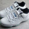 AIR JORDAN 11 RETRO LOW WHITE/WHITE/BLACK/LEGEND BLUE