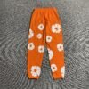 DENIM TEARS COTTON WREATH SWEATPANTS ORANGE