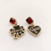 18K CC Heart Earrings
