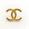 18K CC 24S Brooch