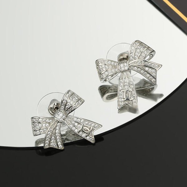 18K CC Bow Tie Diamond Earrings
