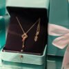 18K T Keys Woven Pink Diamonds Medium Necklace