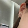 18K T Keys Woven Diamond Earrings