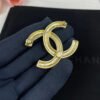 18K CC 24S Brooch