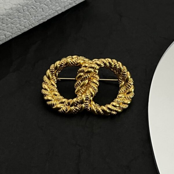 18K CD Revolution Brooch