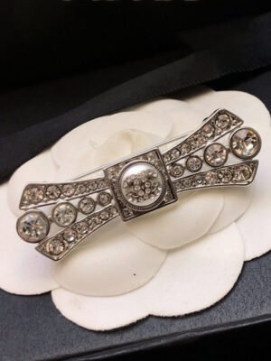 18K CC Bow Tie Diamond Brooch