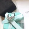 18K T Bow Ribbon Engagement Ring