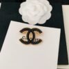 18K CC Black Brooch