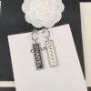 18K CC Typo Drop Earrings