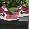 JORDAN 1 MID x CHICAGO BLACK TOE
