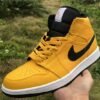 JORDAN 1 MID x UNIVERSITY GOLD BLACK