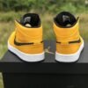 JORDAN 1 MID x UNIVERSITY GOLD BLACK